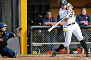 Missouri first baseman Catherine Lee connects with the ball against Illinois on March 12th during the Tigers' second game of the DeMarini Invitational. Lee later hit a home run and the Tigers beat the Fighting Illini 4-3.